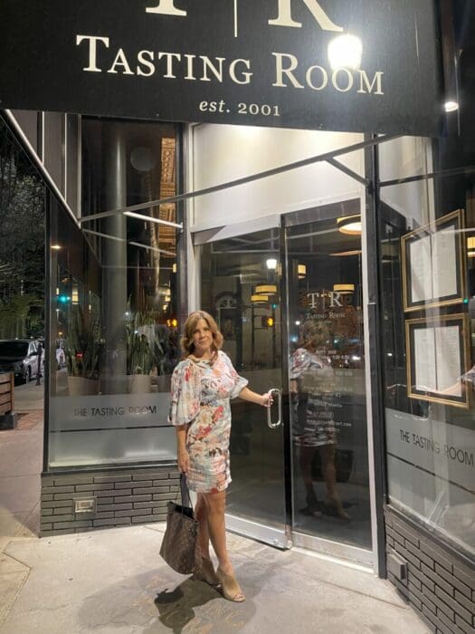 Nicole at the Entrance of the Tasting Room in Downtown Frederick Maryland One of Fredericks Best Upscale Restaurants