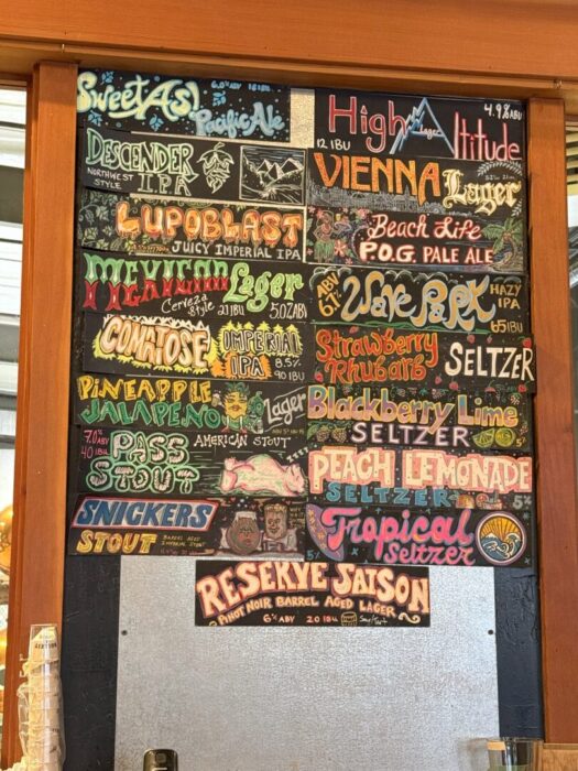 Colorful Chalkboard Beer and Seltzer Menu with Creative Stylized Text and Illustrations Names Like Lupoblast Descender Ipa and Peach Lemonade Seltzer Are Displayed Each with Unique Fonts Colors and Small Decorative Drawings Colorful Chalkboard Beer and Seltzer Menu with Creative Stylized Text and Illustrations Names Like Lupoblast Descender Ipa and Peach Lemonade Seltzer Are Displayed Each with Unique Fonts Colors and Small Decorative Drawings