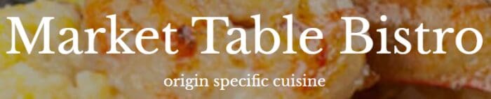 White text reads Market Table Bistro and origin specific cuisine over a blurred background of food, possibly scrambled eggs and roasted meat, capturing the essence of a bistro known for locally sourced, seasonal dishes.