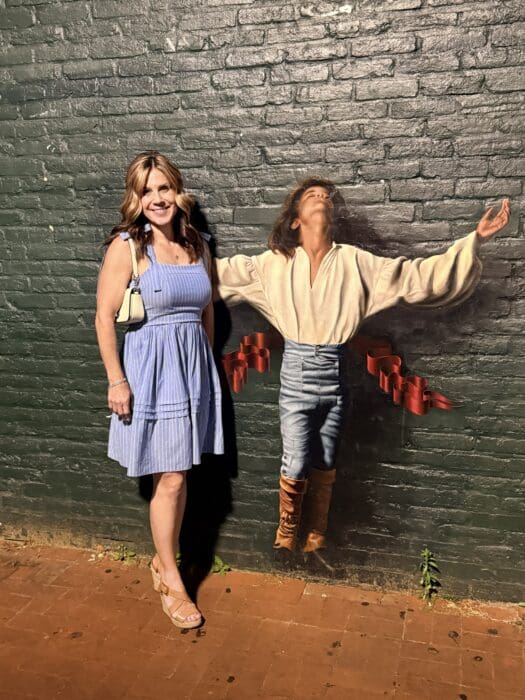 Nicole from Epicfrederick at a Downtown Frederick Wall Mural