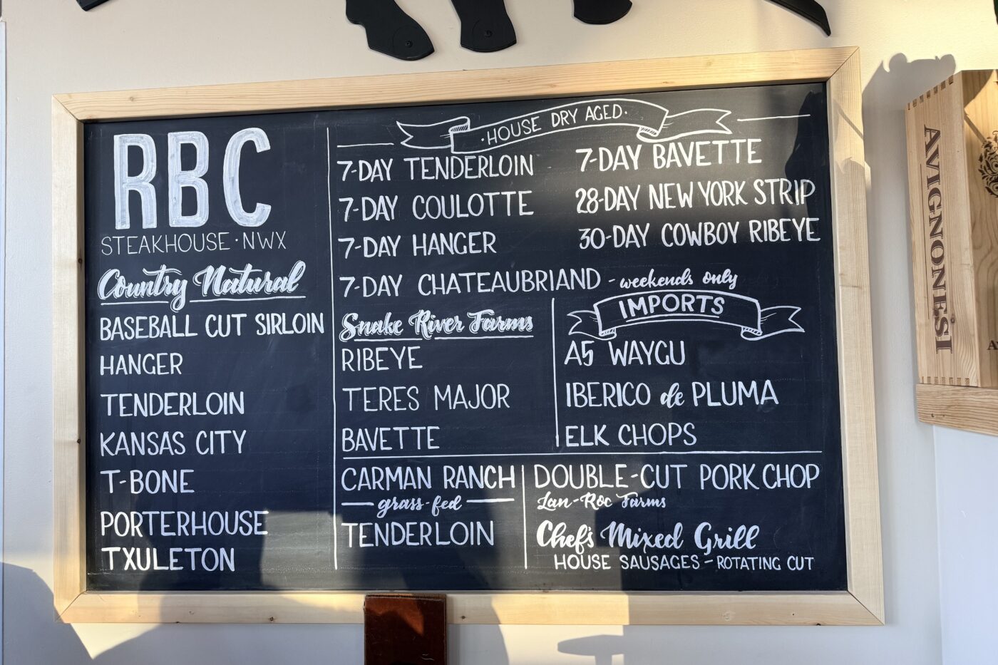 Chalkboard Menu with Handwritten Beef Cuts and Daily Specials Framed in Light Wood Rbc Steakhouse