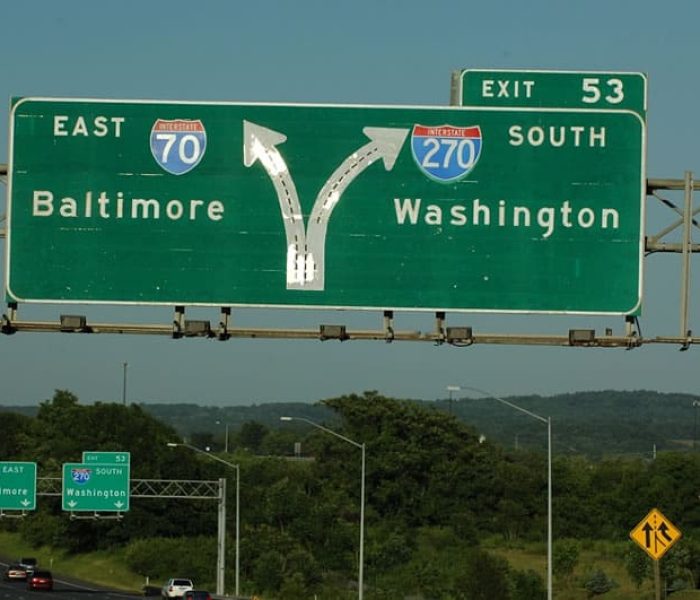 Green highway sign: East I-70 to Baltimore and South I-270 to Washington, Exit 53.