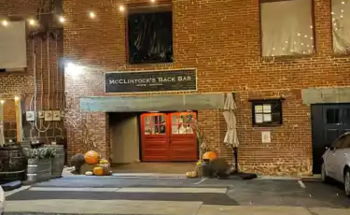 Mcclintocks-Back-Bar-at-night-scaled