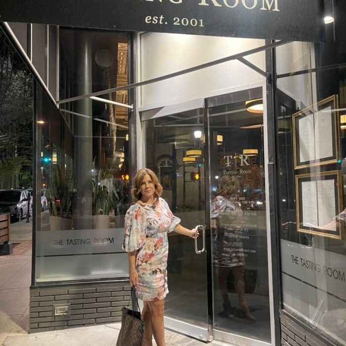Nicole at the entrance of The Tasting Room in downtown Frederick, Maryland. One of Frederick's Best upscale restaurants.